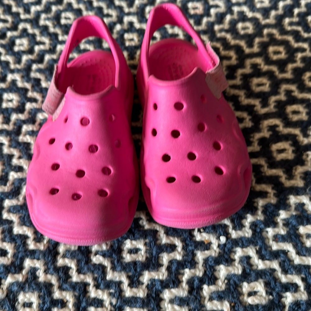 Pink slip on crocs